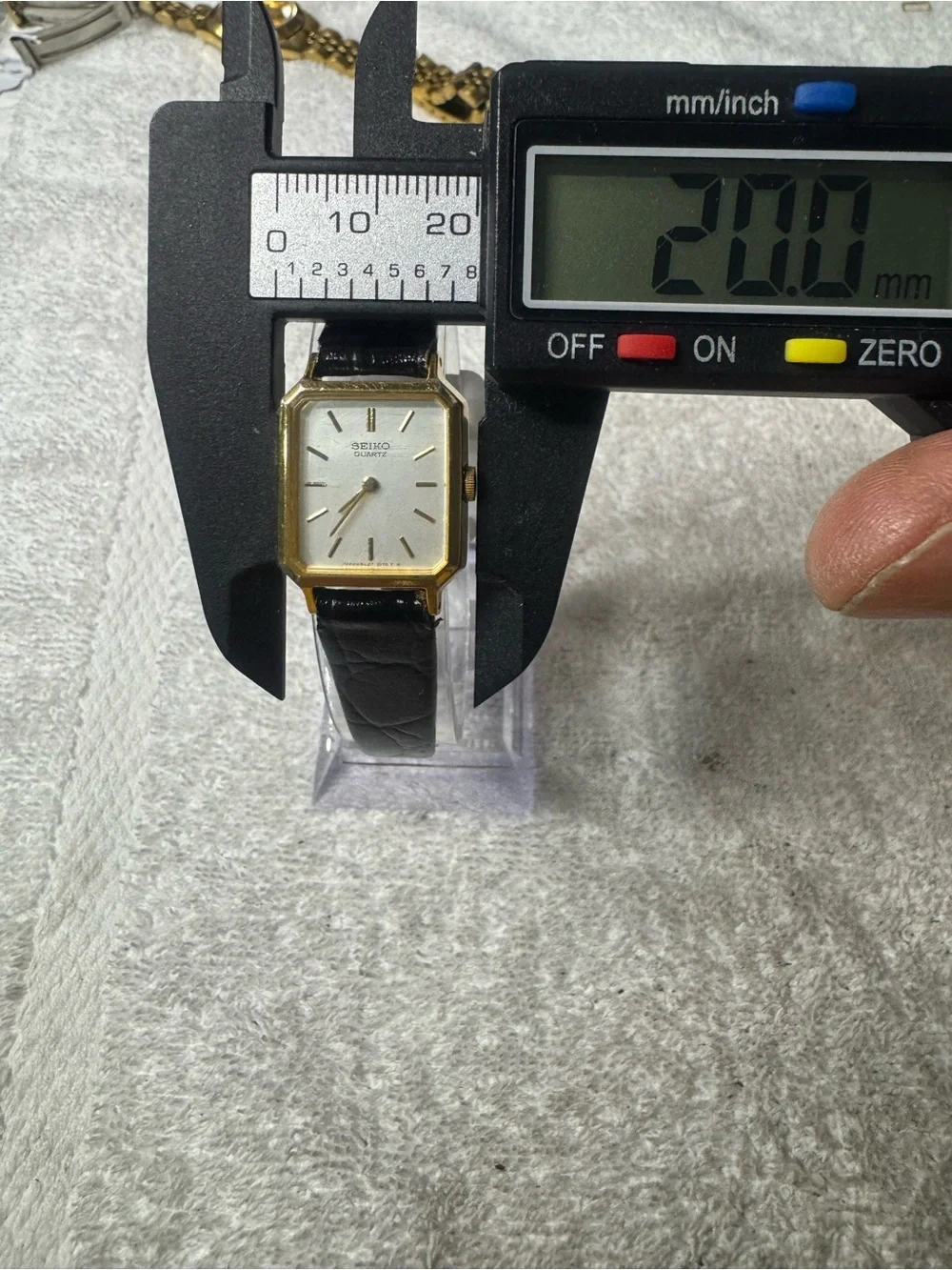 Seiko Gold Tone Square Watch with Silver Dial and Black Strap
